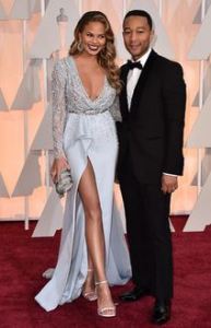 CHRISSY TEIGEN AND JOHN LEGEND AT THE 2015 OSCARS